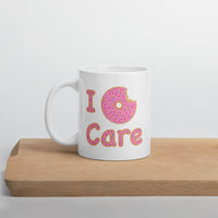 I Donut Care Punny White glossy mug