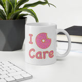 I Donut Care Punny White glossy mug