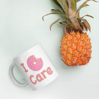 I Donut Care Punny White glossy mug