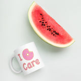 I Donut Care Punny White glossy mug